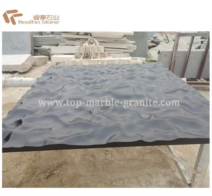Black granite tile with wave finish